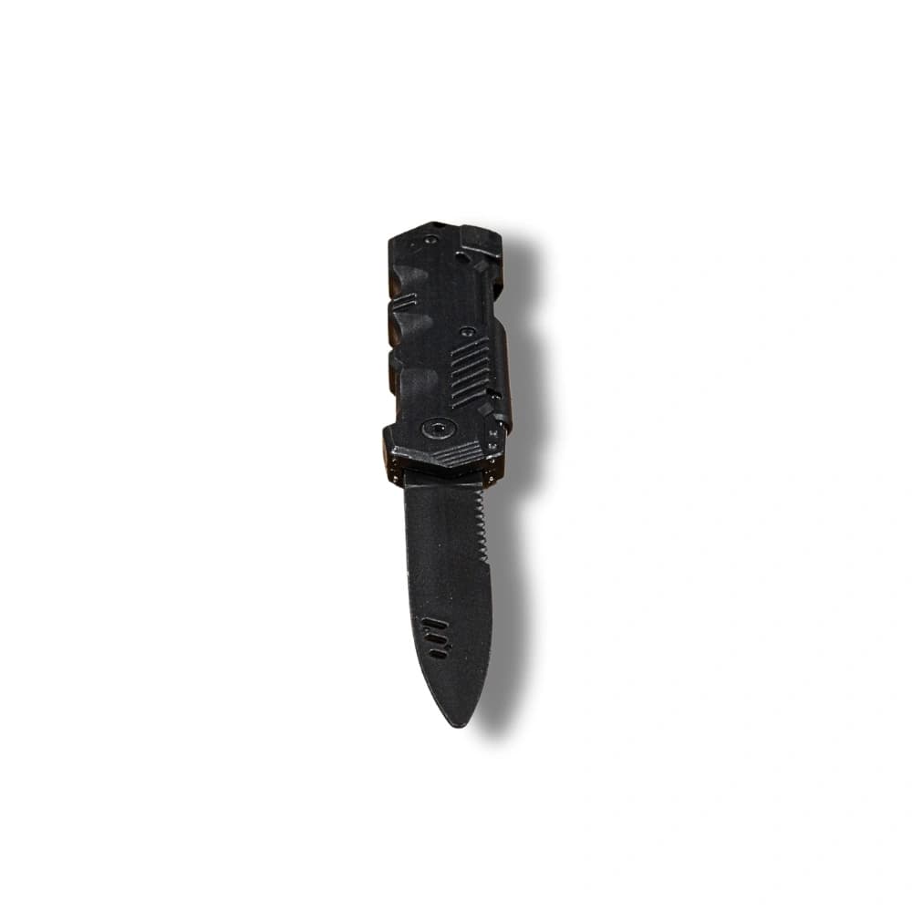 Retractable training knife with a textured handle and partially extended serrated blade.